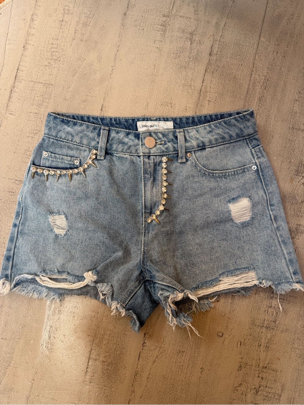 Light Blue Distressed Denim Shorts with Rhinestone Trim